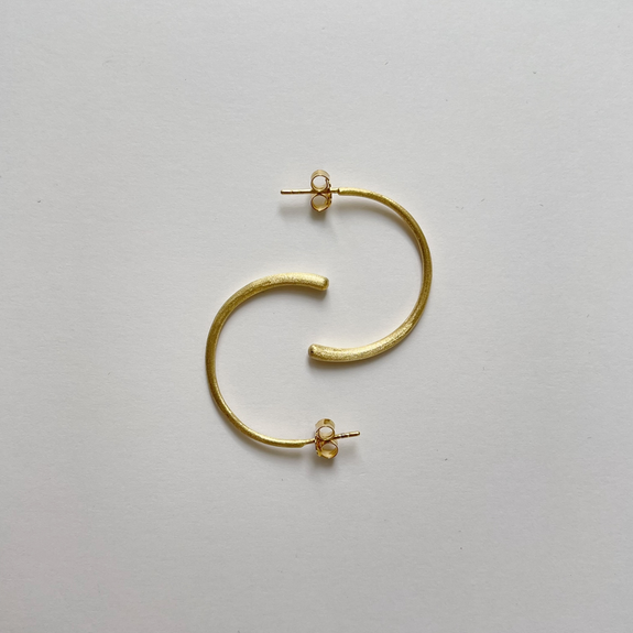 Shaped Earrings-These gracefully shaped curved earrings with a twist are stunningly elegant and add that special finishing touch to any outfit.All the Earrings in our collection are delicately and expertly handcrafted in 925 Sterling Silver and are all available in a Silver or Gold Finish