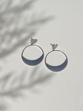 Load image into Gallery viewer, Unlock the mystic powers of the Crescent Moon to radiate spirituality, wisdom and feminine power with these Hooped Moon Stud Earrings. For that special touch and to make your stud earrings even more special, all the earrings in our collection are delicately and expertly handcrafted in 925 Sterling Silver and finished with a Rhodium Plating.