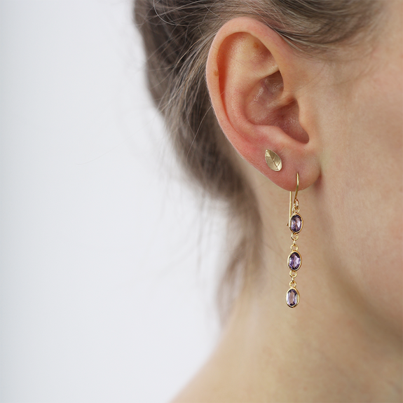 With Six Amethyst gemstones, the most popular of the quartz gemstones, these earrings are a luxurious addition to any jewellery collection and perfect to wear at any occasion. All the Earrings in our collection are delicately and expertly handcrafted in 925 Sterling Silver and are all available in a Silver or Gold Finish.