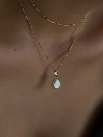 Pearl Dream Pendant with Necklace handcrafted in Silver and finished with an 18ct Gold Finish.On its own or with a Necklaces.